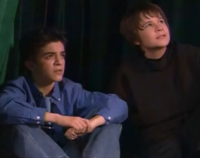 Two young actors from a Nickelodeon show sitting together, reflecting the former Nickelodeon child star story. Two young actors from a Nickelodeon show sitting together, reflecting the former Nickelodeon child star story.