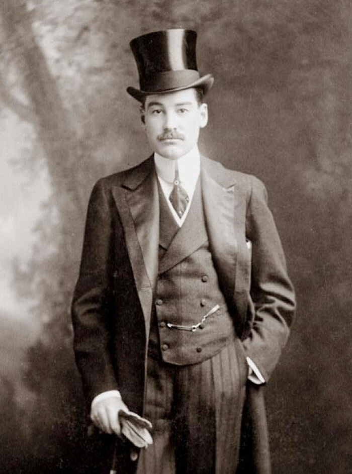 Vintage portrait of a wealthy man in formal attire and top hat, illustrating the world’s richest family generational decline.