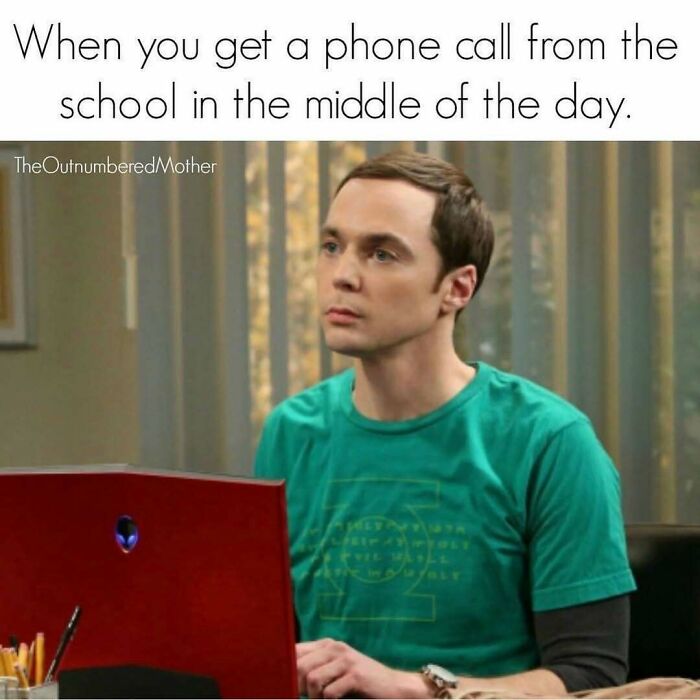 Man looking concerned at laptop, illustrating relatable moment in hilarious parenting memes back-to-school season.