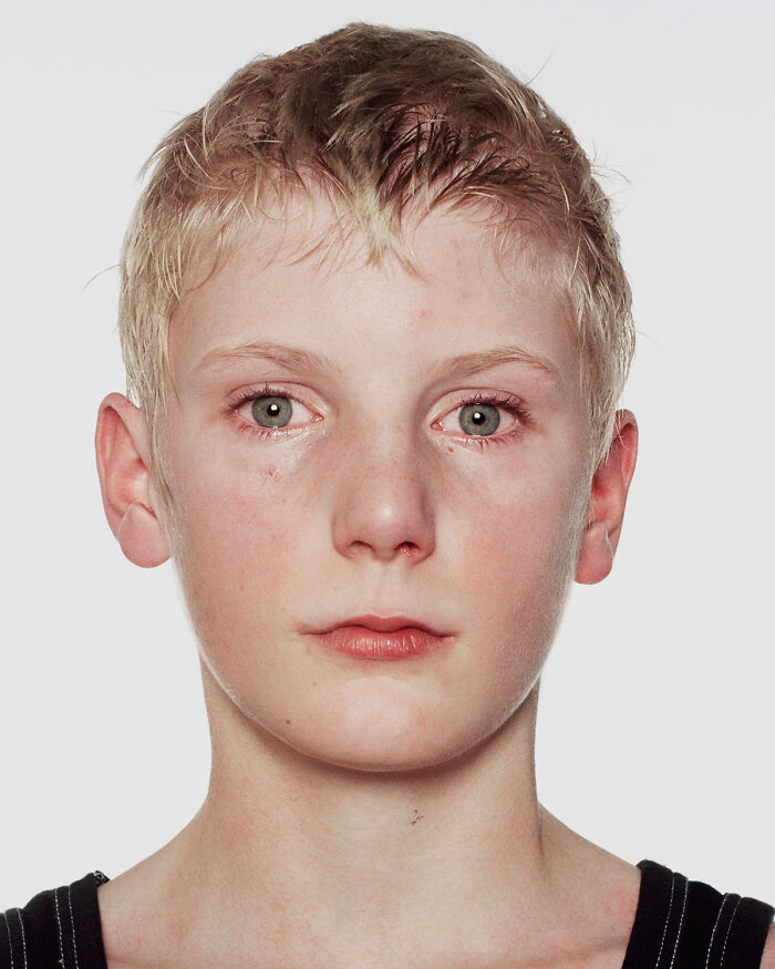 Young boxer with light hair and subtle facial bruises, captured powerfully before and after their first match.