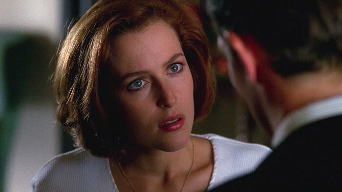 A well-written female character in a movie, breaking stereotypes and showing genuine emotion in a close-up scene.