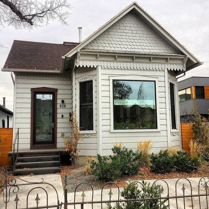 Charming old home with classic detailing and a cozy front garden, perfect for those seeking lovely old homes to move into.