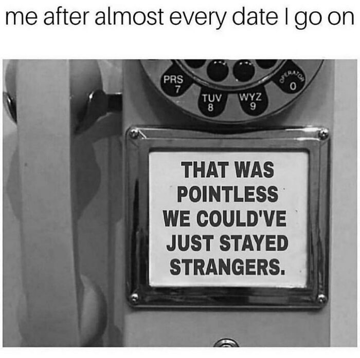 Vintage rotary phone with a sign humorously expressing dating frustrations, illustrating funny dating memes about love life experiences.