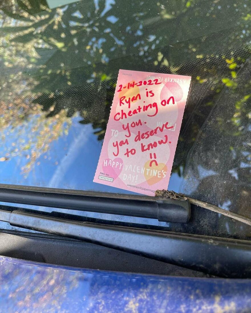 Note on windshield of a car revealing cheating, highlighting themes from pics that make people want to live in the middle of nowhere.