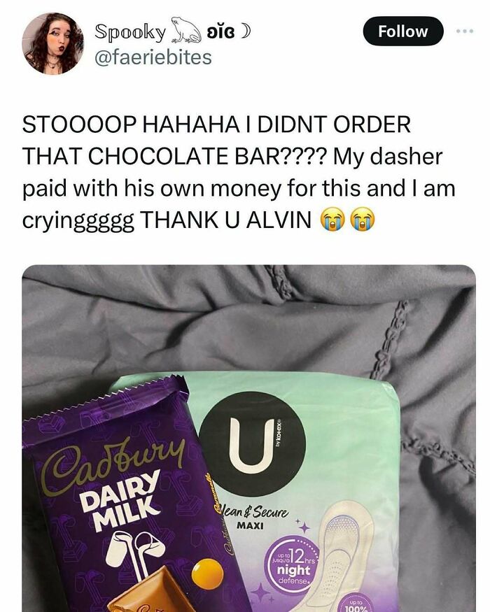 Tweet showing a relatable post about navigating the world as just a girl with a chocolate bar and feminine hygiene product.