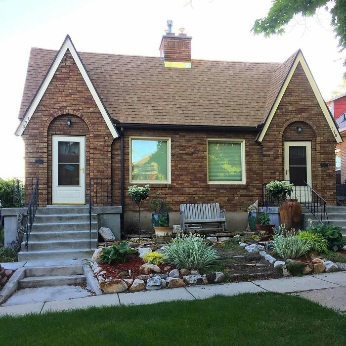 Charming old homes with brick exterior, quaint landscaping, and inviting front steps perfect for lovely old homes enthusiasts.