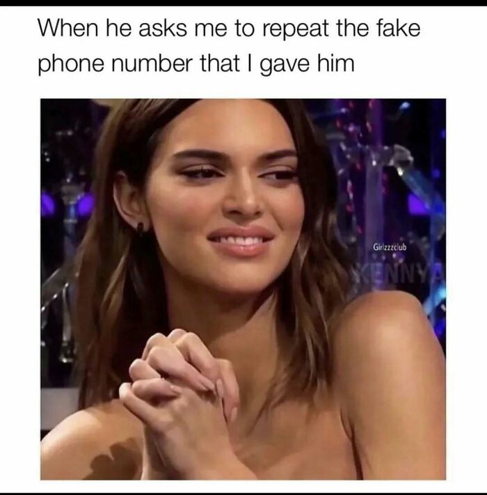 Woman smirking with clasped hands in a funny dating meme about repeating a fake phone number, capturing dating life humor.