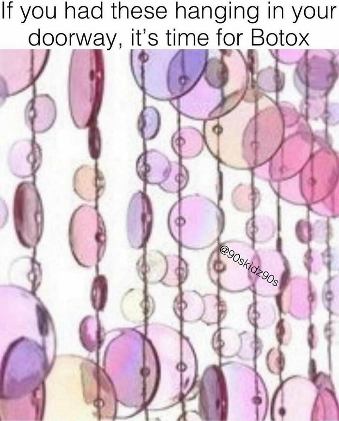 Beaded door curtain with pink and purple circles, a nostalgic 90s decor item many millennials will recognize.