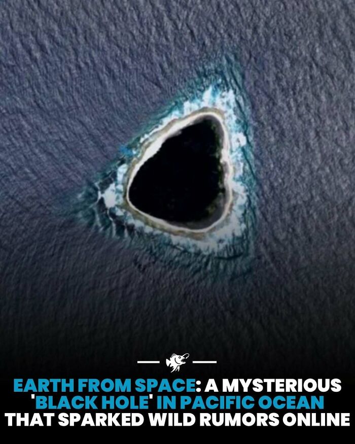 Aerial view of a mysterious deep sea black hole formation in the Pacific Ocean surrounded by ocean waves and coral.