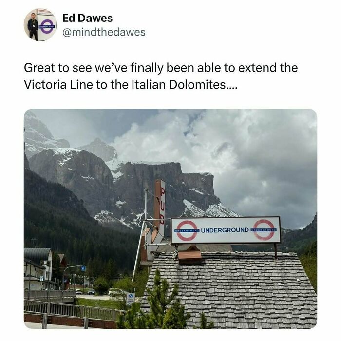 A humorous London Underground sign placed in a mountainous area, blending Great London memes with UK humor.