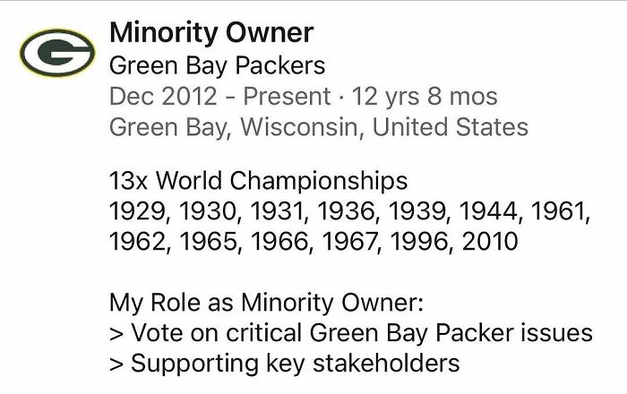 Text showing a minority owner role with Green Bay Packers, highlighting dedication amid hustle culture work-life balance challenges.