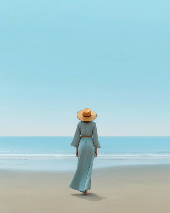 Woman in a hat walking on a beach, captured in a dreamy minimalist photo conveying peaceful escape vibes.