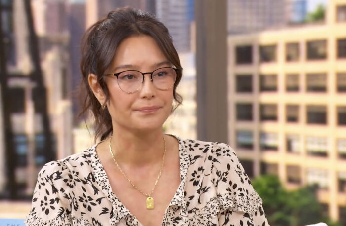 Bruce Willis wife wearing glasses and floral blouse defending decision to move him amid dementia battle. Bruce Willis wife wearing glasses and floral blouse defending decision to move him amid dementia battle.