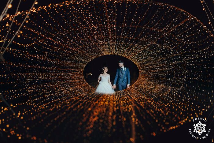 Surrounded By A Galaxy Of Lights, They Walk Into Forever Hand In Hand