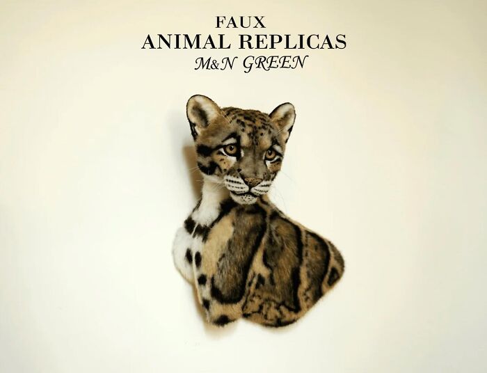 Realistic animal sculpture of a cheetah crafted with synthetic materials by artists M&N Green without harming wildlife.