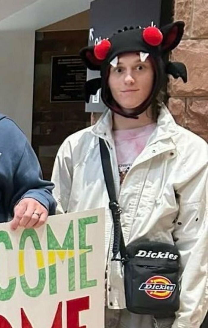 Young man wearing a quirky hat and white jacket, linked to Charlie Kirk assassin&rsquo;s roommate problematic behavior claim.