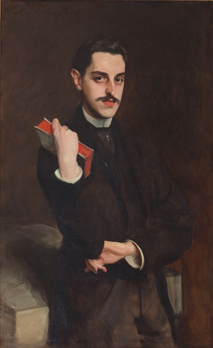 Portrait of a wealthy young man holding a book, symbolizing the world’s richest family losing it all generation by generation.