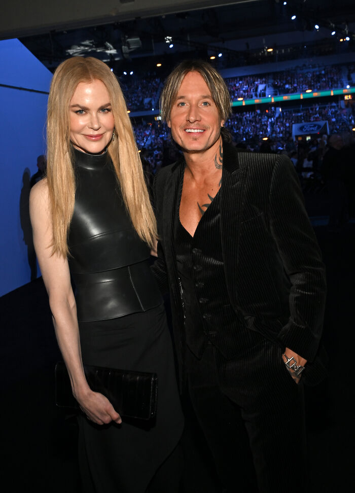 Nicole Kidman and Keith Urban posing together at a formal event amid split and hilarious reactions discussion.