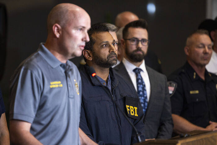 FBI agents and officials at a press conference addressing the Charlie Kirk case amid growing calls for FBI Director to quit.