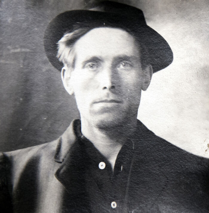 Black and white portrait of an American folk hero wearing a hat and coat, representing historic folk hero stories.