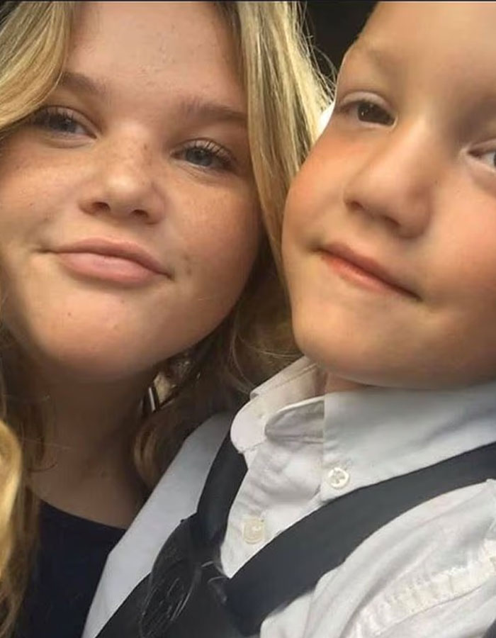 Close-up of a woman and young boy, representing convicted doomsday cult mom and her surviving son.