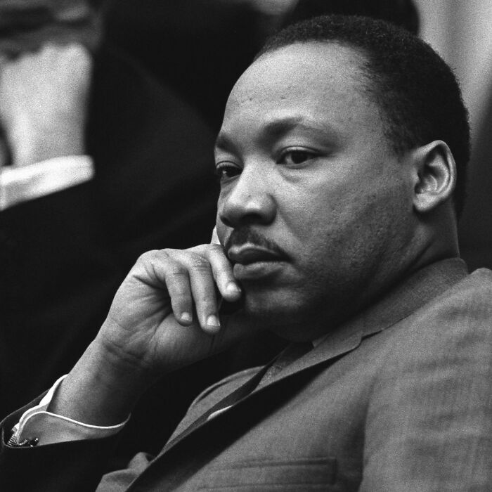 Black and white photo of a thoughtful man in a suit illustrating famous historical quotes that everyone thinks are true.