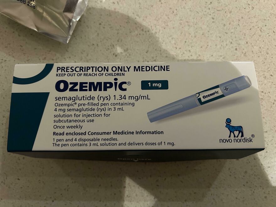 Ozempic prescription pen box on countertop showing medication details related to Ozempic lawsuit and vision loss claims.