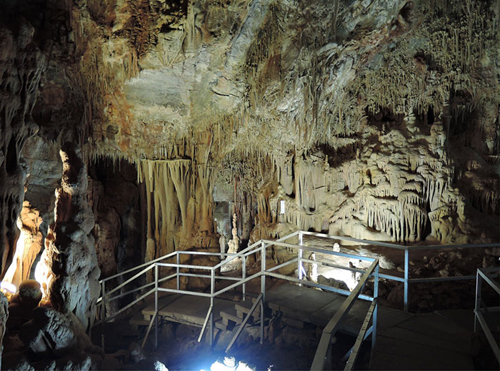 Interior view of a cave with rock formations where the mysterious Petralona Man skull was found 60 years ago.
