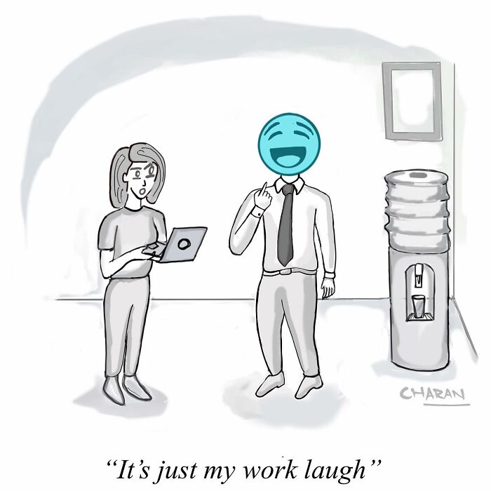 One-panel comic showing a man with a laughing emoji head at the office next to a woman with a laptop, humor in today’s world.
