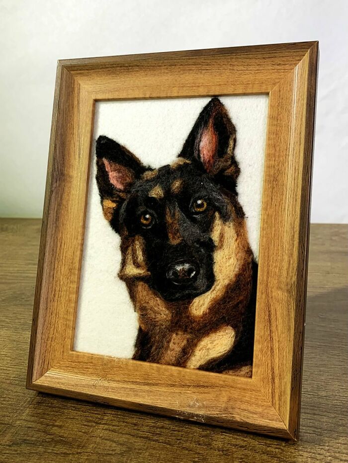 Framed wool felt pet portrait of a realistic German Shepherd dog with detailed fur and expressive eyes.