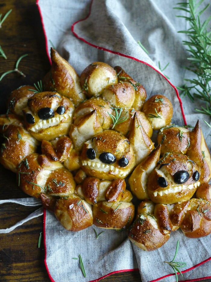Creative meals for kids by a mom from Japan featuring adorable animal-shaped bread with olive eyes and rosemary garnish.