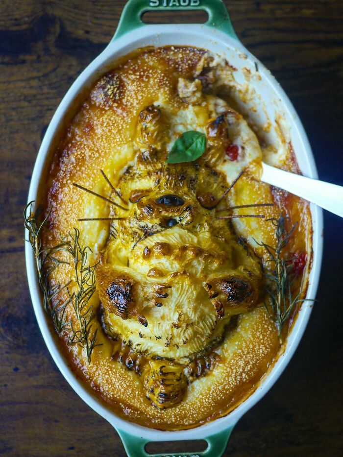 Creative meal shaped like a cute animal character baked in a casserole, showcasing inventive cooking for kids.
