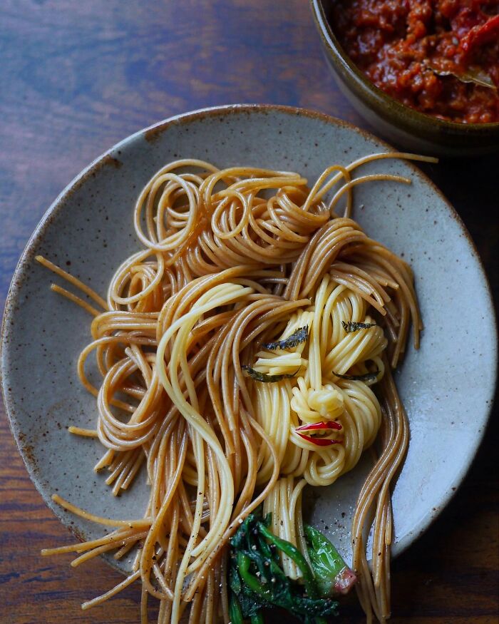 Creative meals made from pasta shaped like a child's face, showcasing incredibly creative cooking for kids by a Japanese mom.