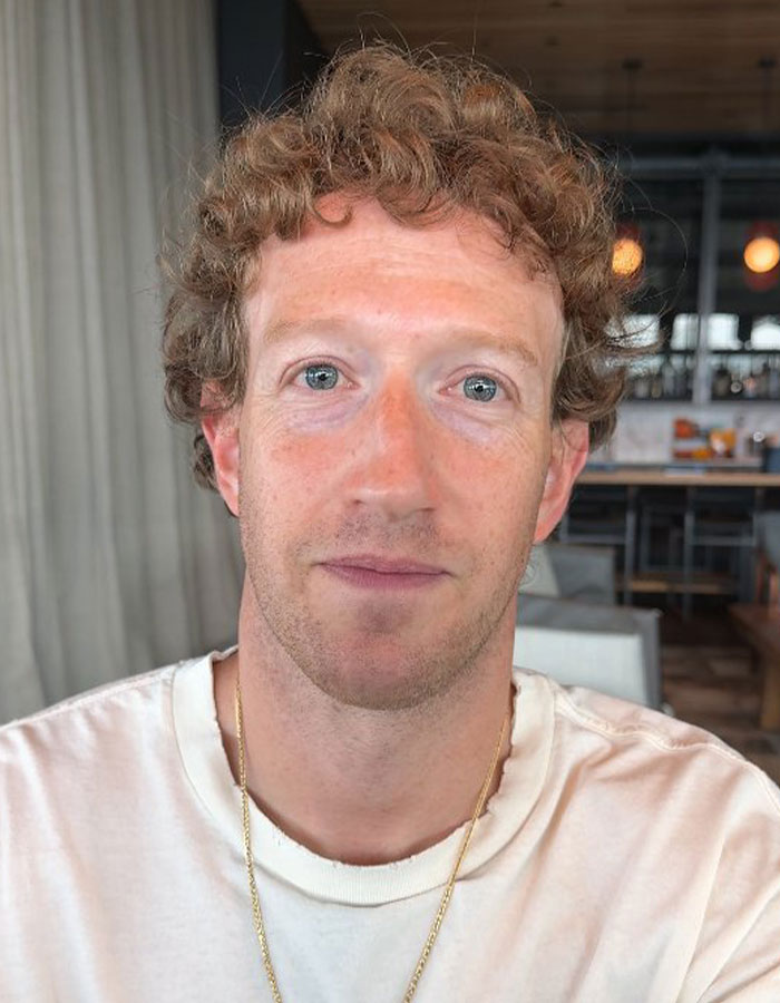 Mark Zuckerberg close-up portrait in casual setting capturing an embarrassing hot mic moment with Donald Trump.