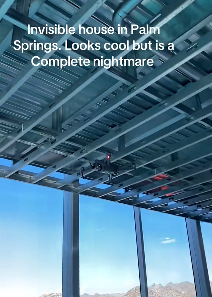 Invisible house interior in Palm Springs with metal beams and large windows, related to Airbnb owners charging influencer.