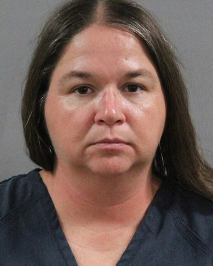 Amish mom with serious expression in mugshot after confession to officers about drowning 4YO son going viral