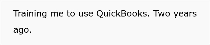 Person reading training materials on QuickBooks on a computer, illustrating a boss pretending never gave notice situation.