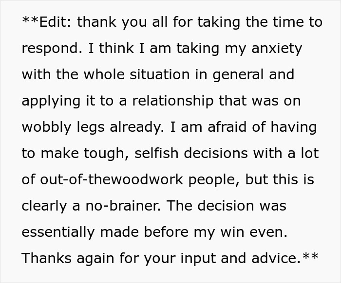 Alt text: Person reflecting on anxiety and tough decisions after girlfriend wants to quit job following lottery win.