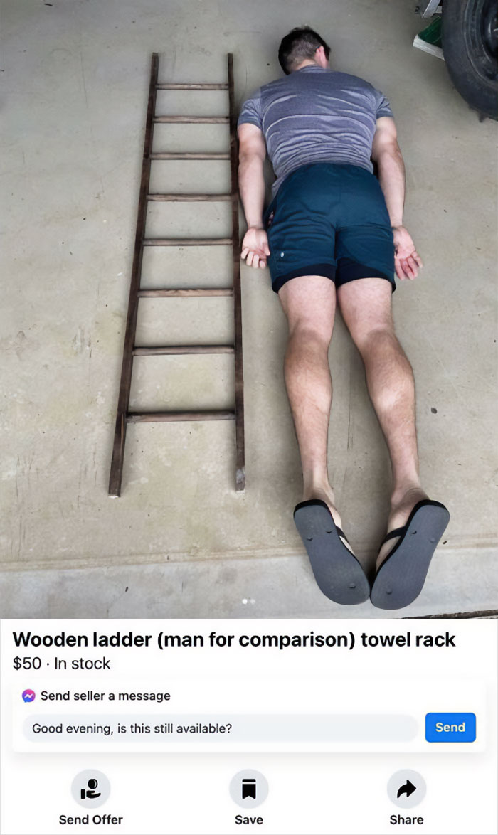 Man lying next to a wooden ladder for scale, demonstrating size comparison with human for scale concept.
