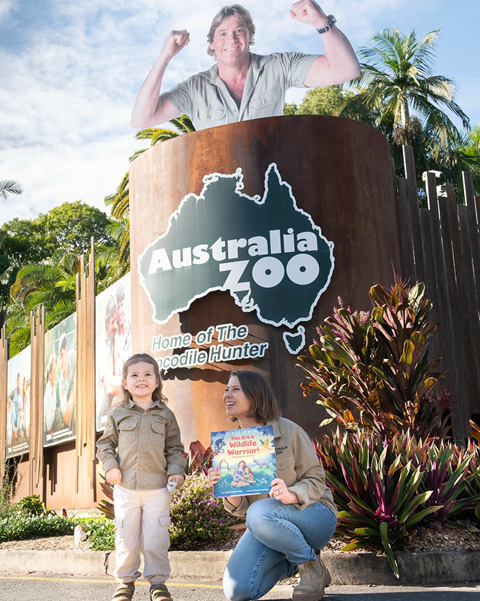 Bindi Irwin and child outside Australia Zoo, symbolizing Bindi Irwin's surprising decision to leave Australia. Bindi Irwin and child outside Australia Zoo, symbolizing Bindi Irwin's surprising decision to leave Australia.