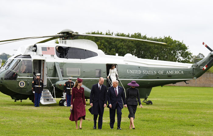 Melania Trump and Kate Middleton walking with officials near Marine One helicopter during state visit analyzed by body language expert Melania Trump and Kate Middleton walking with officials near Marine One helicopter during state visit analyzed by body language expert