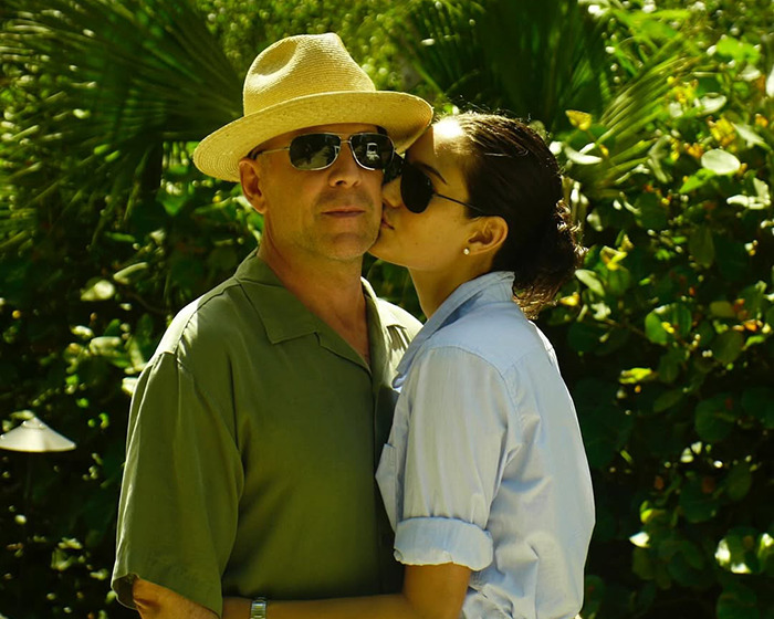 Bruce Willis and his daughter outdoors, she shows affection as she shares update on his dementia condition.