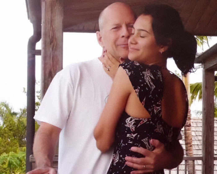 Bruce Willis and his daughter sharing a heartfelt moment amid his dementia health update outdoors.