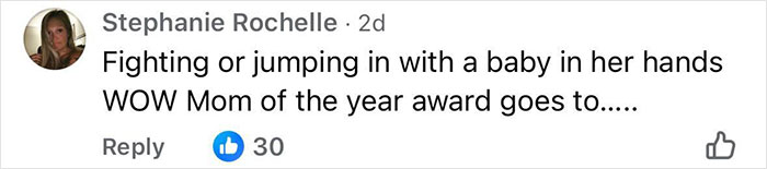 Comment on social media criticizing a mother for fighting while holding a baby, related to an angry mob ambushing a Walmart employee.