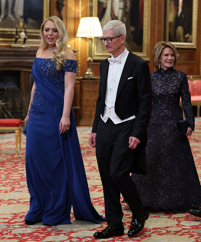 Kate Middleton in a blue gown seated with an unexpected Trump relative at a formal state banquet event. Kate Middleton in a blue gown seated with an unexpected Trump relative at a formal state banquet event.