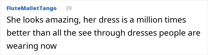 Ashley Graham wearing a body-hugging dress that accentuates and highlights more of her figure than expected.