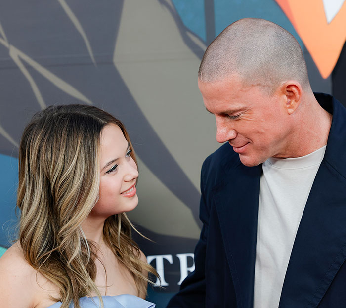 Channing Tatum, 45, and his 26-year-old girlfriend smiling at each other at a public event amid age gap discussions. Channing Tatum, 45, and his 26-year-old girlfriend smiling at each other at a public event amid age gap discussions.