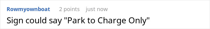 Comment on a post about parking enforcement, mentioning a sign that could say Park to Charge Only for EV charging spots.