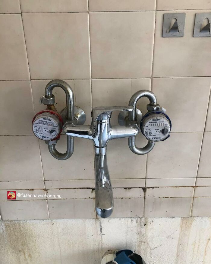 Construction design with water meters awkwardly attached to a faucet, showing a confusing plumbing setup.