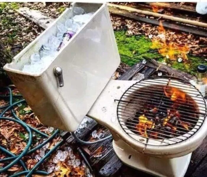 Toilet converted into a barbecue grill with cooler on tank, an example of unusual construction and design ideas.